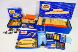Hornby Dublo - A group of boxed items including a Through Station, a signal Cabin, Footbridge,