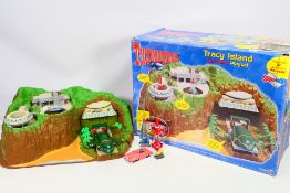 Thunderbirds - A boxed Tracy Island Electronic Playset with vehicles.