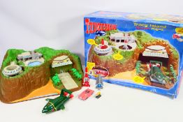 Thunderbirds - A boxed Tracy Island Electronic Playset with vehicles.