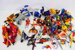 Transformers - A collection of unboxed Transformers including Airazor, Jinbao, Tigatron, Ironhide,