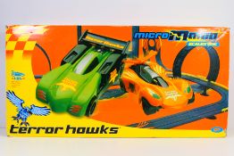 Scalextric - A boxed Micro Mania Terror Hawks slot car set in 1/64 scale # G1014.
