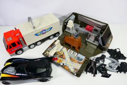 Micro Machines - Batman - 2 x Micro Machines carry case trucks and a large Batmobile with Batman