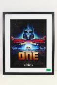 Transformers - A framed Transformers One movie poster.