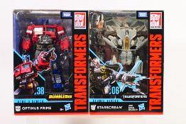 Transformers - 2 x factory sealed Transformers Generations Studio Series figures,