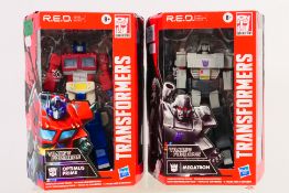 Transformers - 2 x factory sealed Transformers R.E.