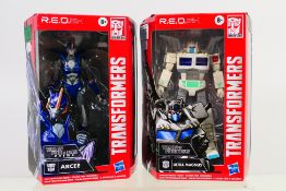 Transformers - 2 x factory sealed Transformers R.E.