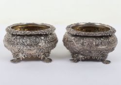 A pair of George III chased silver dishes, John Cormick, London 1818