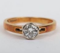 An 18ct gold and diamond ring