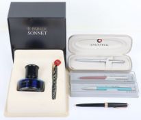 A group pens including a Parker Sonnet in its box