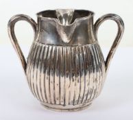 A Victorian silver double spout cream jug, 1870, London, Edward H Stockwell