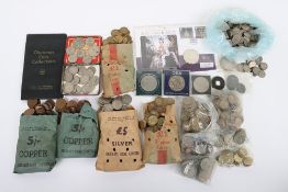 A tin of coins including GB Threepences, Shillings etc