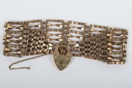 A 9ct gold padlock pendant bracelet