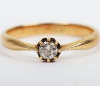 An 18ct gold and diamond ring