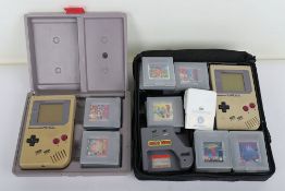 Two Gameboy Consoles with Games.