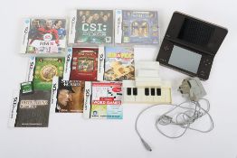 Nintendo DS Console with Piano and Games.