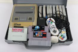 Super Nintendo SNES Console with Games and carry case.