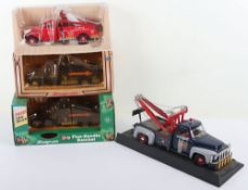 Three Tow Truck Die Cast models.