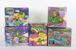 Five Boxed Vintage Teenage Mutant Hero Ninja Turtles Vehicles with accessories Bandai Playmates.