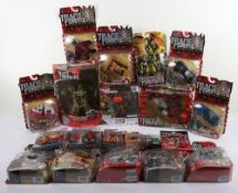 Twenty Modern Transformers Action Figures Boxed Hasbro.