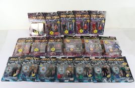 Eighteen Star Trek 90s Action Figures from Playmates moc carded Collector Card series.