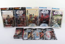 Nine Modern Star Wars Action Figures boxed moc carded.