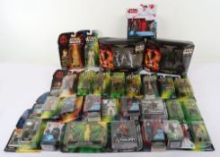 Collection of Twenty Eight Modern Star Wars Action Figures moc carded Hasbro Kenner.