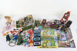 Collection of Vintage and Modern action figures and collectibles.
