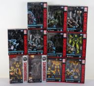 Eleven Modern Transformers Action Figures Boxed Hasbro.