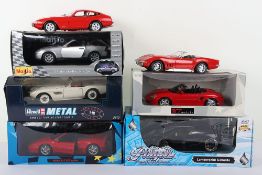 Six 1/18 Scale Die Cast Cars.