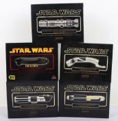 Five Star Wars Master Replicas Scaled Lightsaber’s boxed.