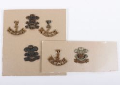 Small assortment of Cap Badges to the Welsh Regiment