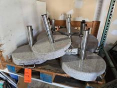 Lot of (9) stone umbrella stands