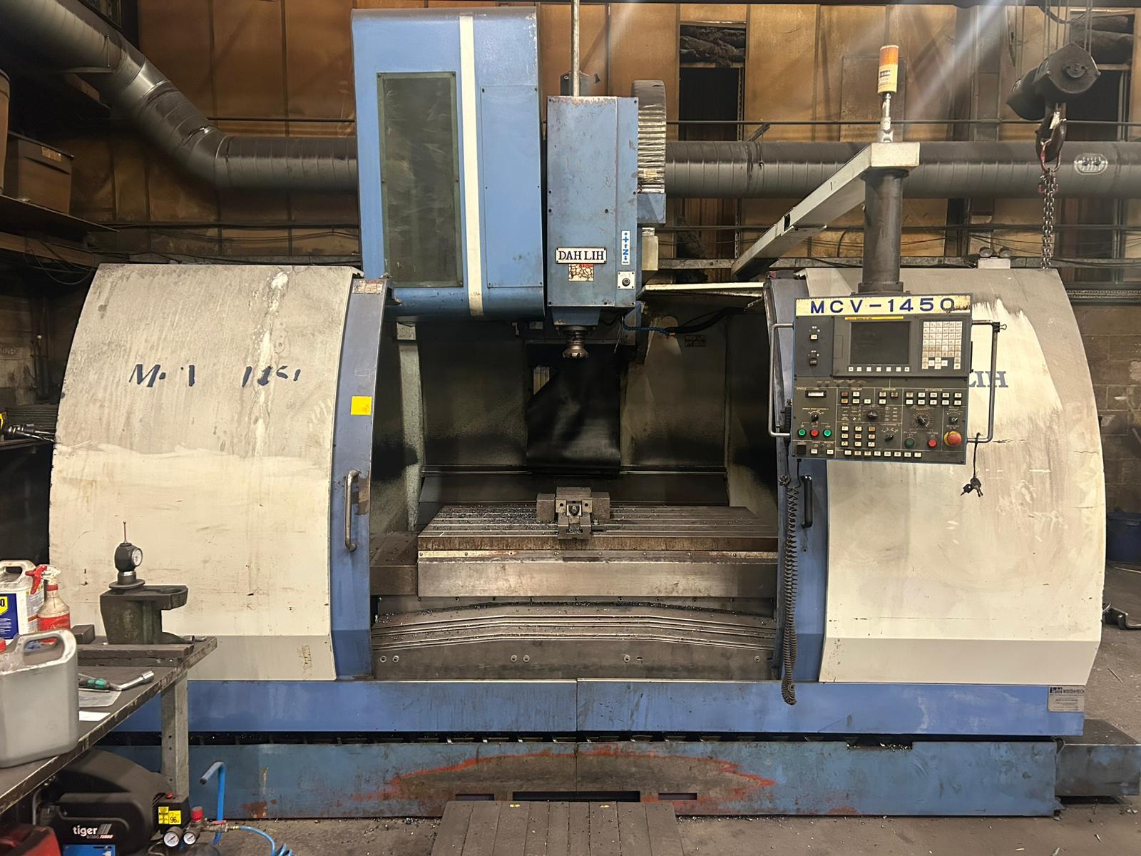 Engineering Equipment to include Milling Machine, Radial Arm Drills, Compressor, Tool Sharpener and Accessories