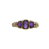 A 9ct gold amethyst three stone ring,