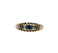 An 18ct gold sapphire and emerald ring,