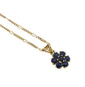 A sapphire cluster pendant and chain,