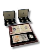 Royal Mint - Two cased proof sets in Sterling silver, together with two banknote sets,