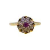 An 18ct gold ruby and diamond cluster ring,