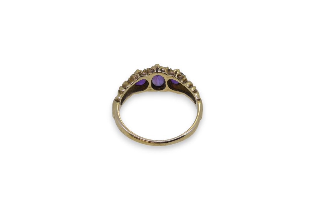 A 9ct gold amethyst three stone ring, - Image 3 of 4