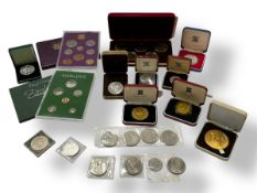 A collection of British, Isle of Man and Zimbabwe coins,