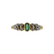 An 18ct gold emerald and diamond ring,