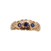 A 9ct gold sapphire three stone ring,