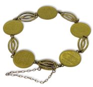 A bracelet with multiple coins,