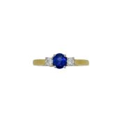 An 18ct gold sapphire and diamond three stone ring,
