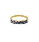 A sapphire half hoop style ring,