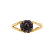 A garnet cluster ring,