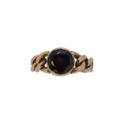 A 9ct gold garnet single stone ring,