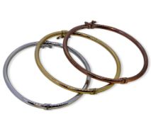 Three 14ct gold bangles,
