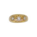 A 9ct gold three stone diamond ring,