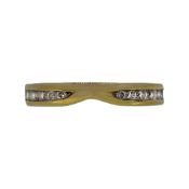 An 18ct gold diamond set band,